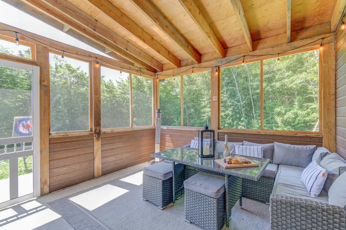 Screened porch with string lights